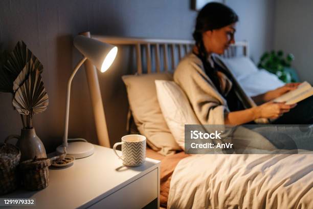 Hot Beverage On A Night Stand Stock Photo - Download Image Now - Night Table, Night, Tea - Hot Drink