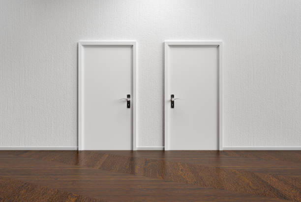 istock White wall with two closed doors and wooden floor 1291980856