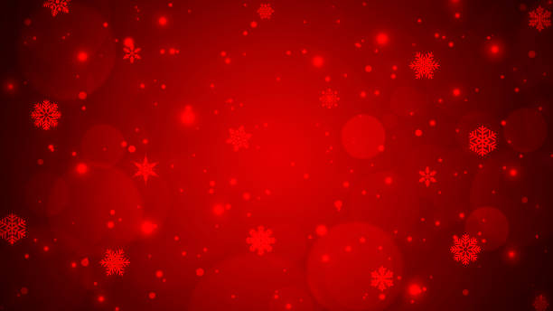 istock Festive winter red gradient bokeh background with snowflakes and snowfall 1291982054