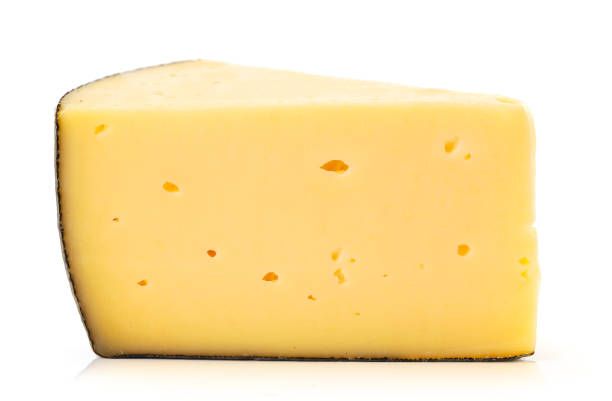 istock Piece of cheese on a white plate. Isolated 1291986283