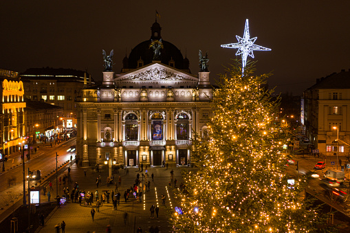Lviv, Ukraine - December 18, 2020: Opening of Christmas tree near Opera House in Lviv, Ukraine. View from drone