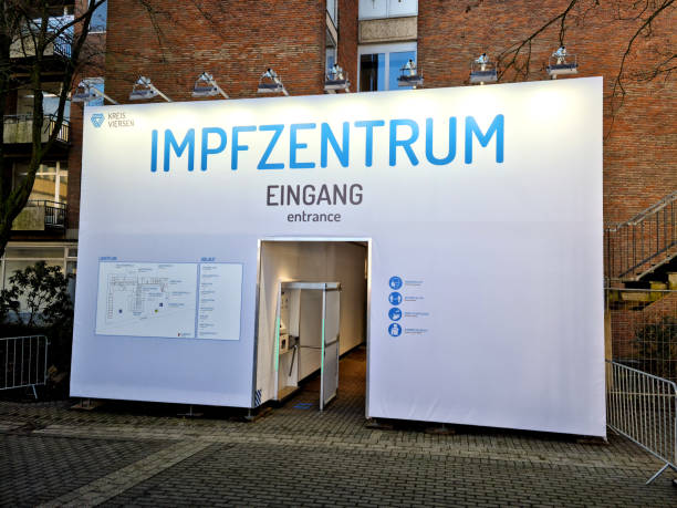 Stadt Viersen, Nordrhein-Westfalen, Deutschland - December 18, 2020. A new coronavirus vaccination center built in a former hospital building. Central entrance to the center. stock photo