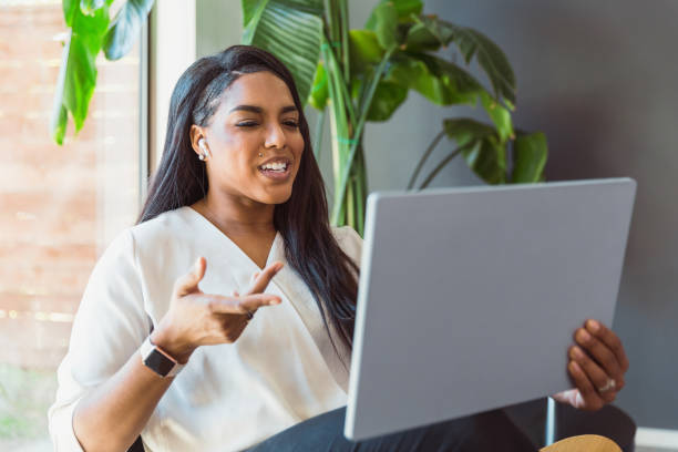 istock Woman uses digital tablet at home 1291989110