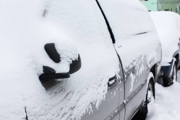 istock Car s covered with fresh snow in winter after storm 1291991984