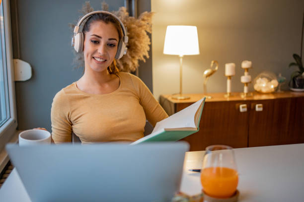 istock Woman working late from home and using laptop 1291992006