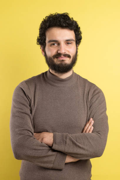 istock Portrait of smiling handsome man 1291993086