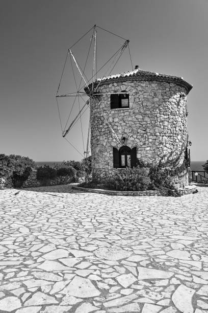 Traditional, historic, stone windmill on Zakynthos island in Greece, monochrome