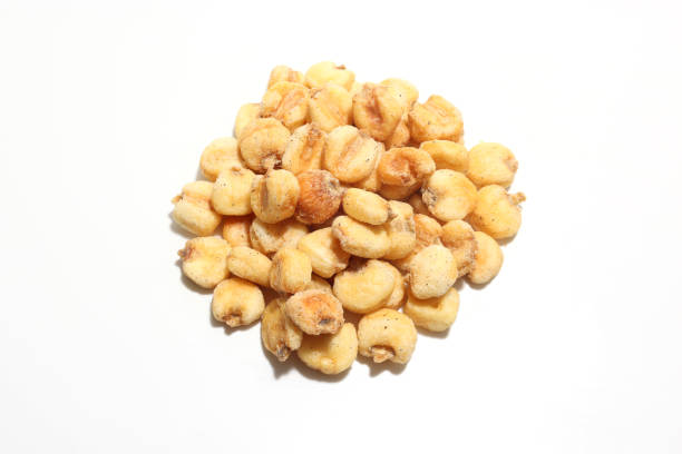 istock giant corns in a white background 1291997100