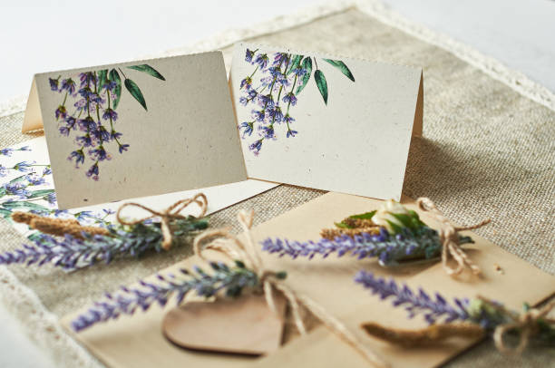 istock cards for lettering names blank, envelope on table with lavender flower 1291997154