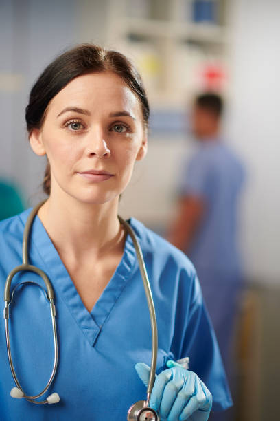 istock proud female nurse portrait 1292000040