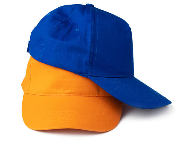 istock Stack of baseball caps isolated on white background 1292000999