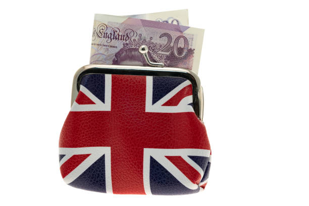 uk union jack flag printed change purse  with a twenty pound note - european union coin european union currency coin isolated objects imagens e fotografias de stock