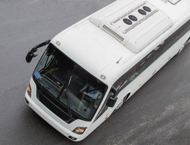 istock tourist bus on a multi-lane road. 1292004053