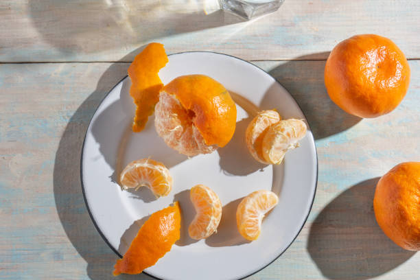 istock Tangerine fruit on wooden background 1292004163