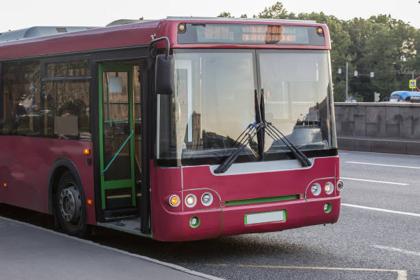istock City bus move down the street 1292004783
