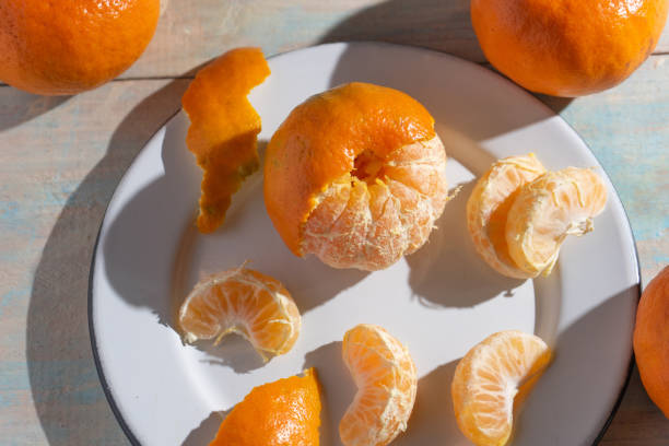 istock Tangerine fruit on wooden background 1292004836