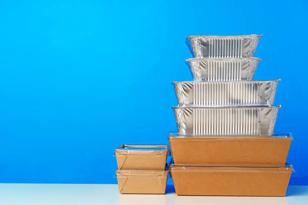 Photo of Assortment of various food delivery containers on table