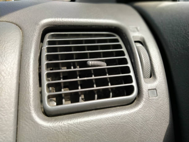 istock ventilation grill in the passenger compartment. Gray car interior. Car engine grill with rust 1292013047