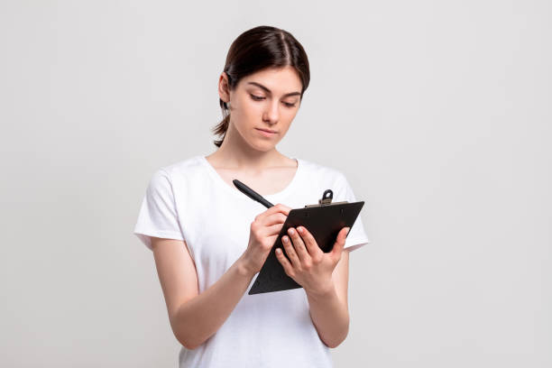 istock logistics management confident woman clipboard 1292013068