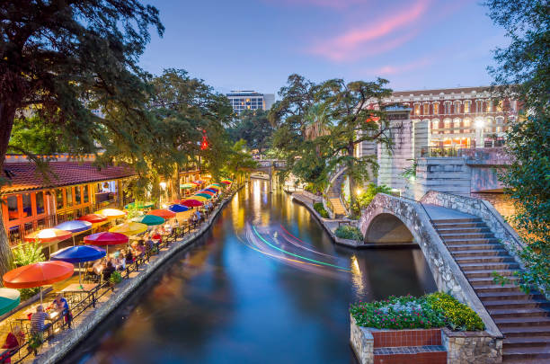 River walk in San Antonio city downtown skyline cityscape of Texas USA stock photo
