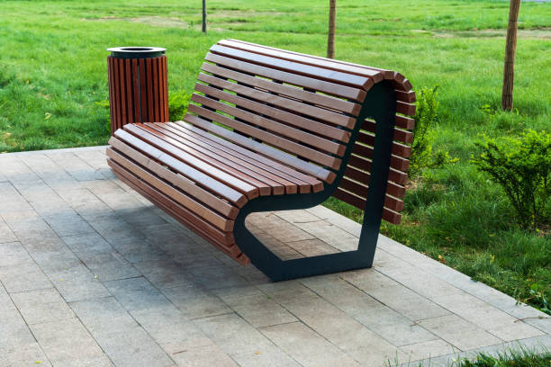istock modern park bench and waste bin made of wooden planks 1292017239