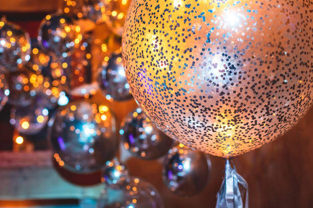 istock Decoration interior elements of restaurant venue banquet hall with multicoloured different helium balloons, on a indoor corporate event or wedding reception or birthday party celebration 1292018756