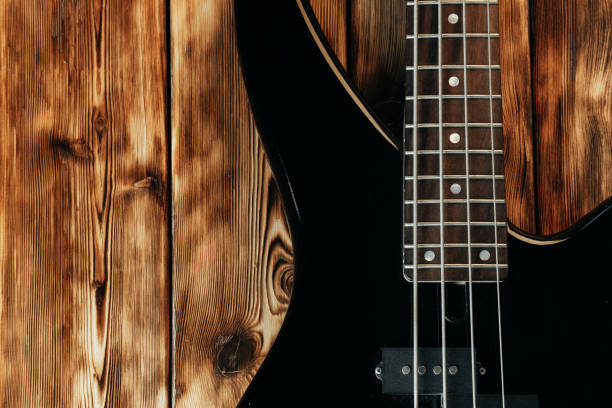 nahaufnahme foto von e-gitarre fingerboard - bass guitar stock-fotos und bilder