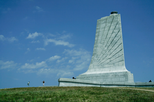 Kill Devil Hills, USA - May 20, 2011: Wright Brothers Monument 60 Foot Granite Monument on top of Big Kill Devil Hill Kitty Hawk, North Carolina. Wilbur and Orville Wright achieved the first successful airplane flights in 1903.