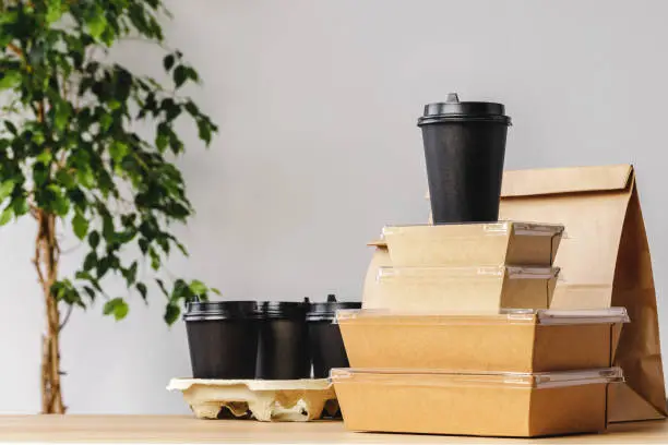 Photo of Assortment of various food delivery containers on table