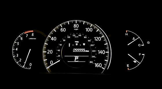 Car speedometer and odometer with the odometer at 99,999 miles