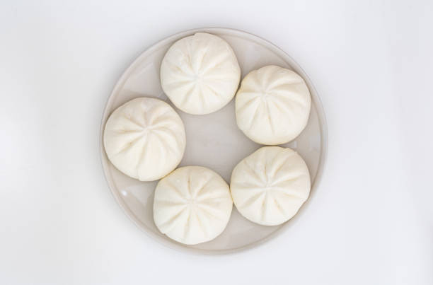 istock Chinese Steamed Buns isolated on white background. 1292033818