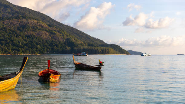 istock Color of sun rise at a peaceful beach 1292035055