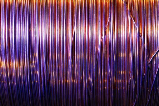 Production of copper wire, cable in reels at factory. Cable factory. Close up.