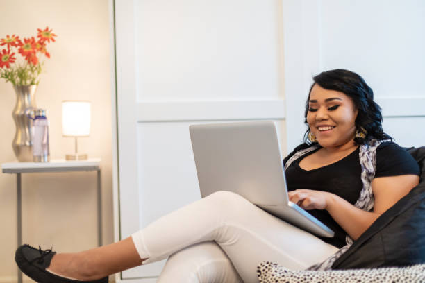 istock Native American Generation Z Female Using Technology Working From Home During Pandemic Photo Series 1292043253