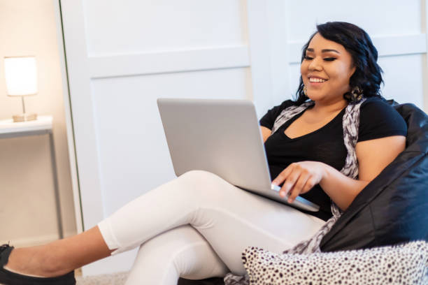 Native American Generation Z Female Using Technology Working From Home During Pandemic Photo Series