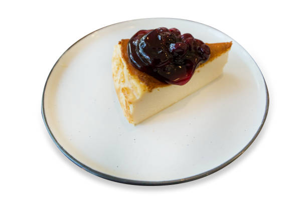 die cut of basque brunt cheese cake with  sweet jams blueberry topping. - brunt imagens e fotografias de stock