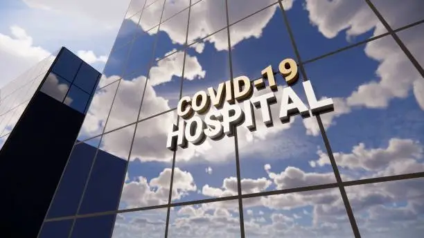 Photo of Covid-19 hospital restricted area on glass skyscraper. Time lapse sky mirrored in building. Epidemic, virus pandemic. Health, clinic, emergency, healthcare and medical concept in 3D rendering .