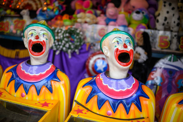 istock A row of laughing clown faces 1292048826
