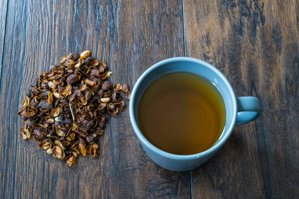 istock Cascara or Coffee Cherry Tea in Cup. Sun-Dried Peeled Coffee Beans. 1292059637