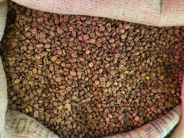 istock Roasted Coffee Beans in Sack Bag. Ready to Grind. 1292060651