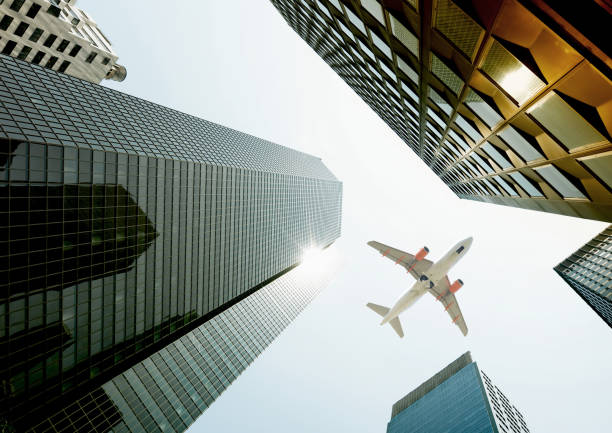 istock Airplane flying over skyscrapers, Lower Manhattan, NYC. 1292062050