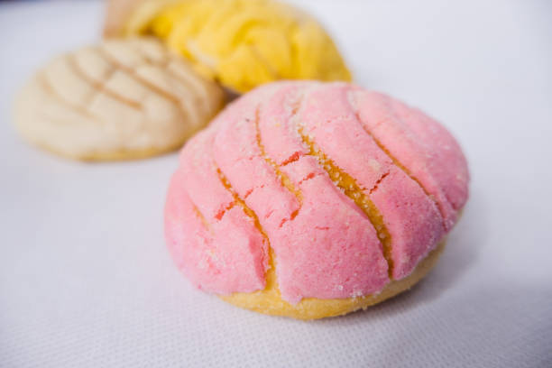 istock Colorful Mexican sweet bread on a white table 1292066338