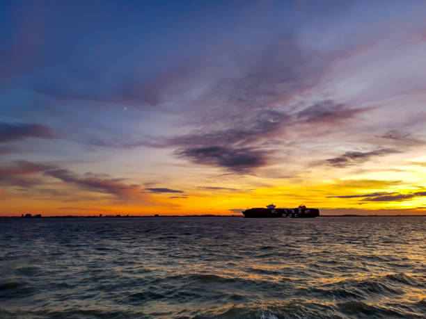istock Reflections of sunset with cloudscape in lake water. 1292068806