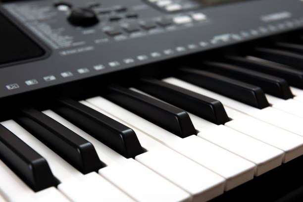 istock Electronic piano keyboard for playing and recording music in studio 1292070504