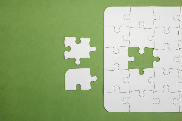 Incomplete Puzzle With One Piece Missing To Complete It There Are Two Pieces  Next To Each Other But Only One Of Them Is The Right One Business Teamwork  Choosing Copy Space Stock Photo - Download Image Now - iStock