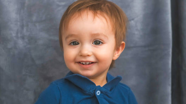 istock The smiling little boy posing on camera 1292079474