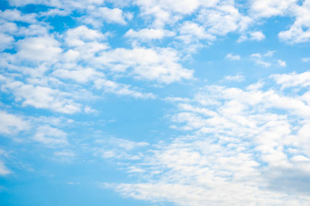 istock Sky blue or azure sky and clouds is bright white background. Everything lies above surface atmosphere outer space is sky. Cloud is aerosol comprising visible mass  liquid, for creative design graphic 1292079804