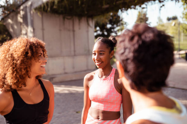 istock Three sporty women talking 1292081827