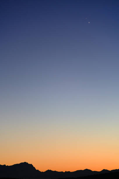 istock Jupiter and Saturn in conjunction with German Mountain Zugspritze as silhouette 1292086037