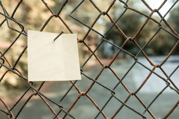 istock a sheet without notes hangs on the iron part of the net 1292086395